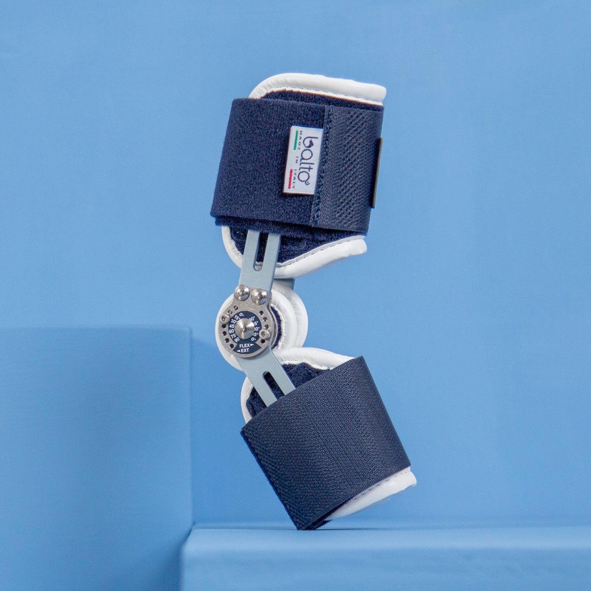 balto flexor brace on blue background