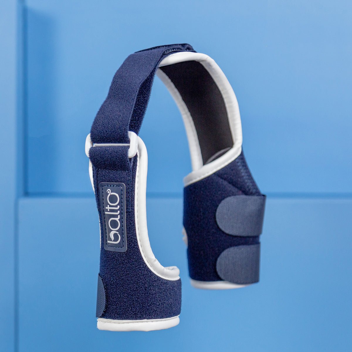 soft elbow brace for dogs on blue background