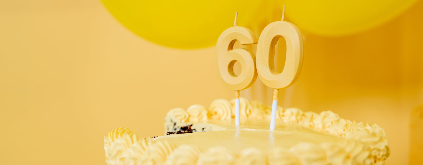 60th anniversary with kvp header image of yellow cake with 60