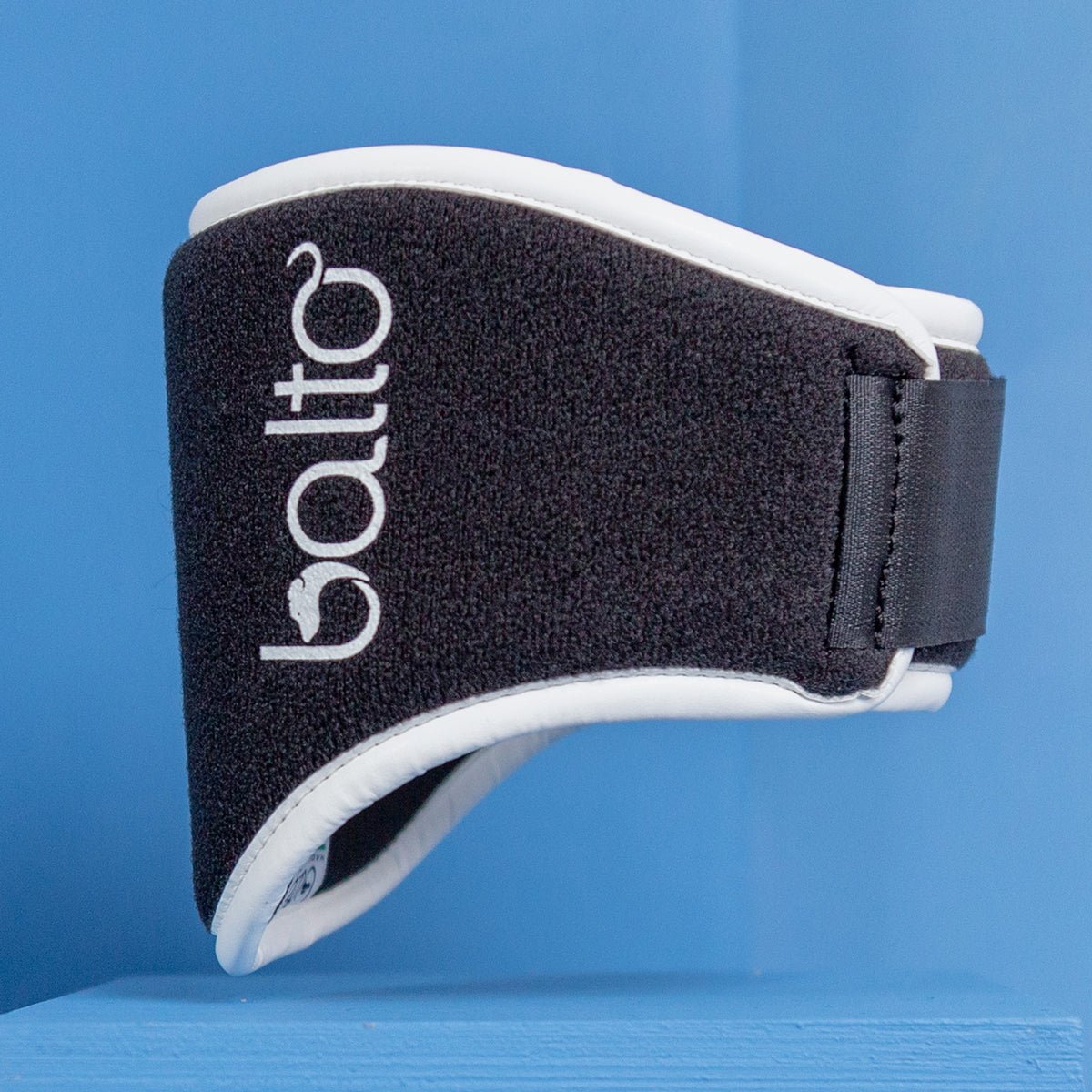 balto eco neck brace for kvp on blue background